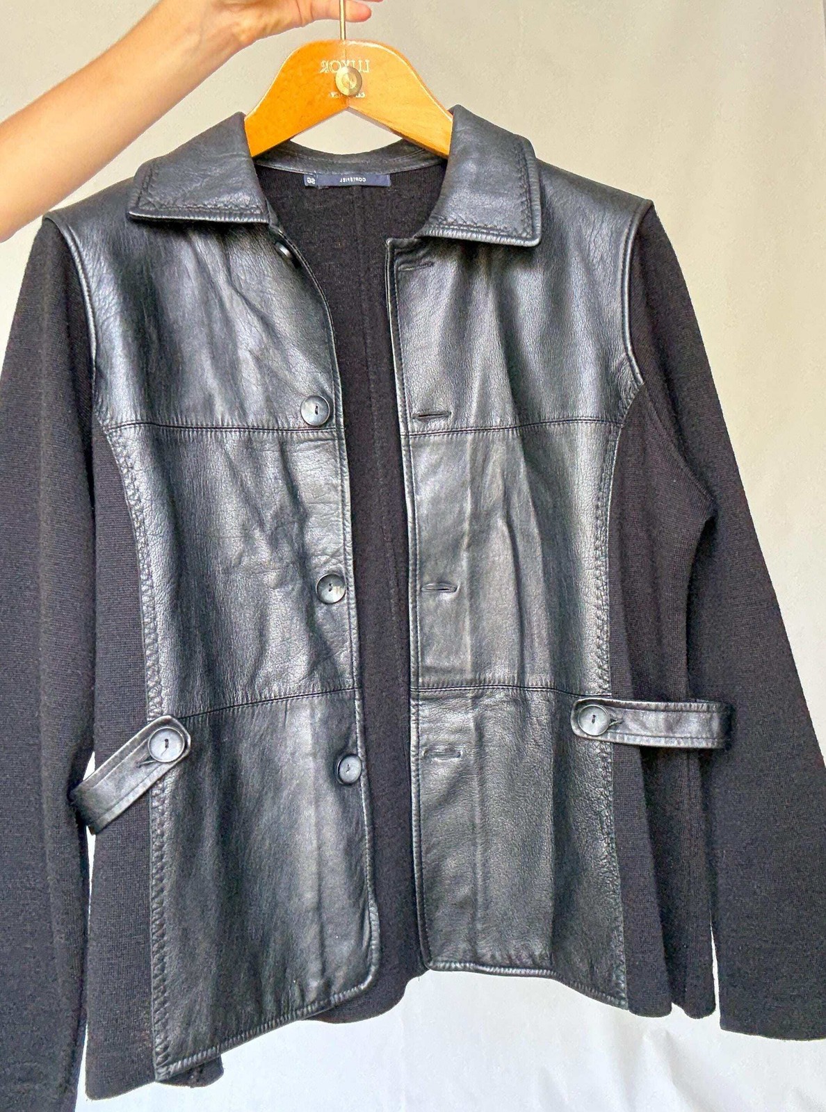 Luxury black leather and wool blend jacket, vintage minimalist style