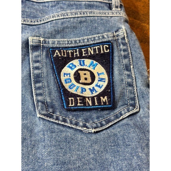 Vintage 1990s BUM equipment denim shorts with large logo patches. SZ 7 waist 28