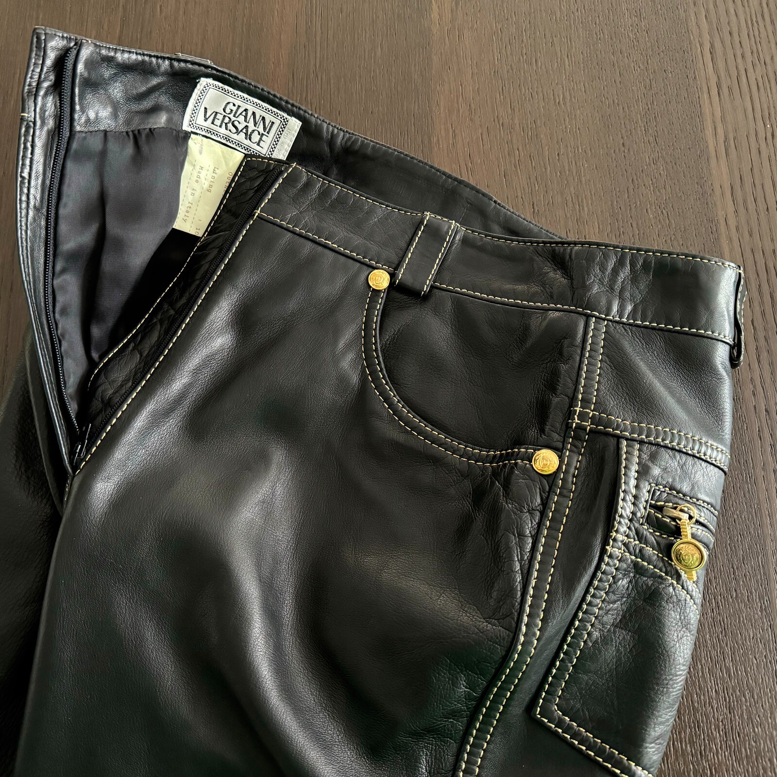 GIANNI VERSACE black leather pants w/ gold stitch size IT 42 from F/W 1992/93