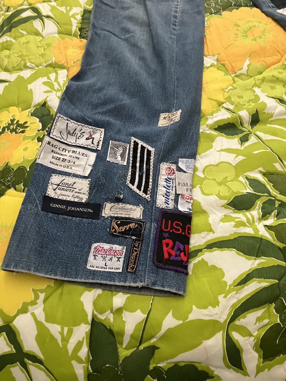 Vintage 1970’s Women’s Chemin De Fer blue jeans with patches.