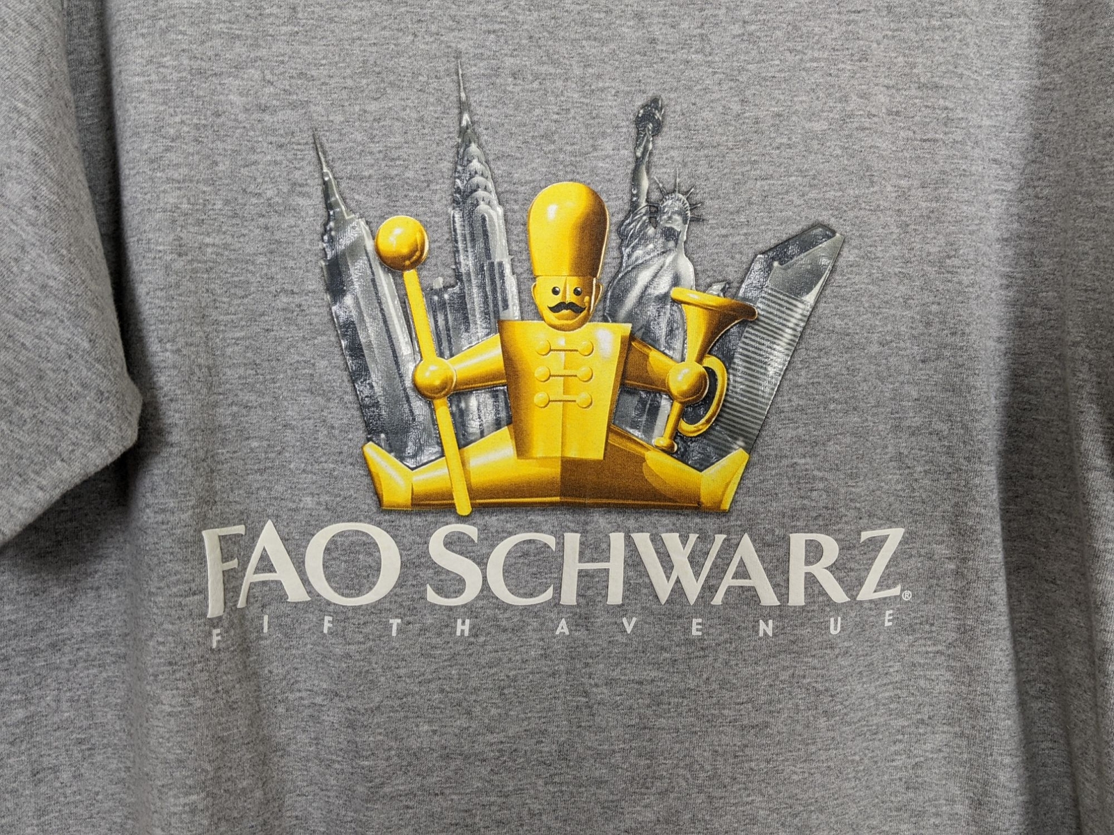 Vintage HRLA Los Angeles short sleeved FAO SCHWARZ Fifth Avenue gray TShirt