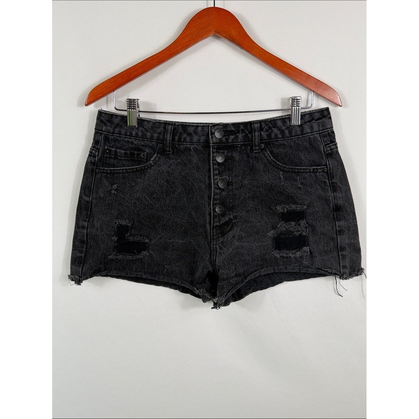 Forever 21 Black Distressed High-Rise Denim Shorts. Paint mark on back. Size 29