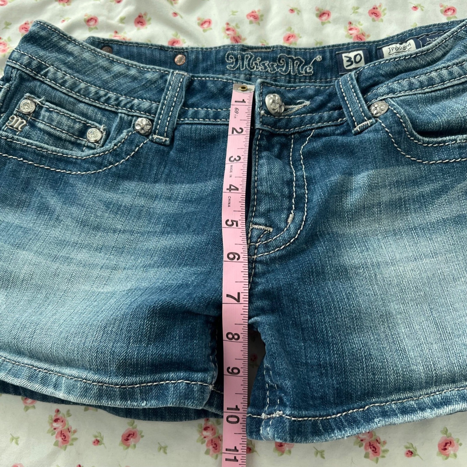 vintage y2k miss me low rise denim shorts with rose embellished back pockets
