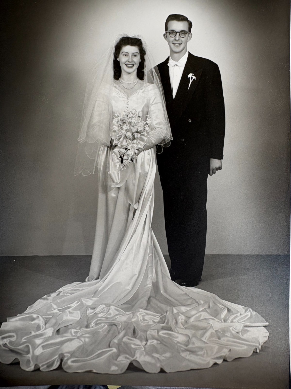 1940s/50s vintage wedding dress in silk faille with cathedral train and buttons