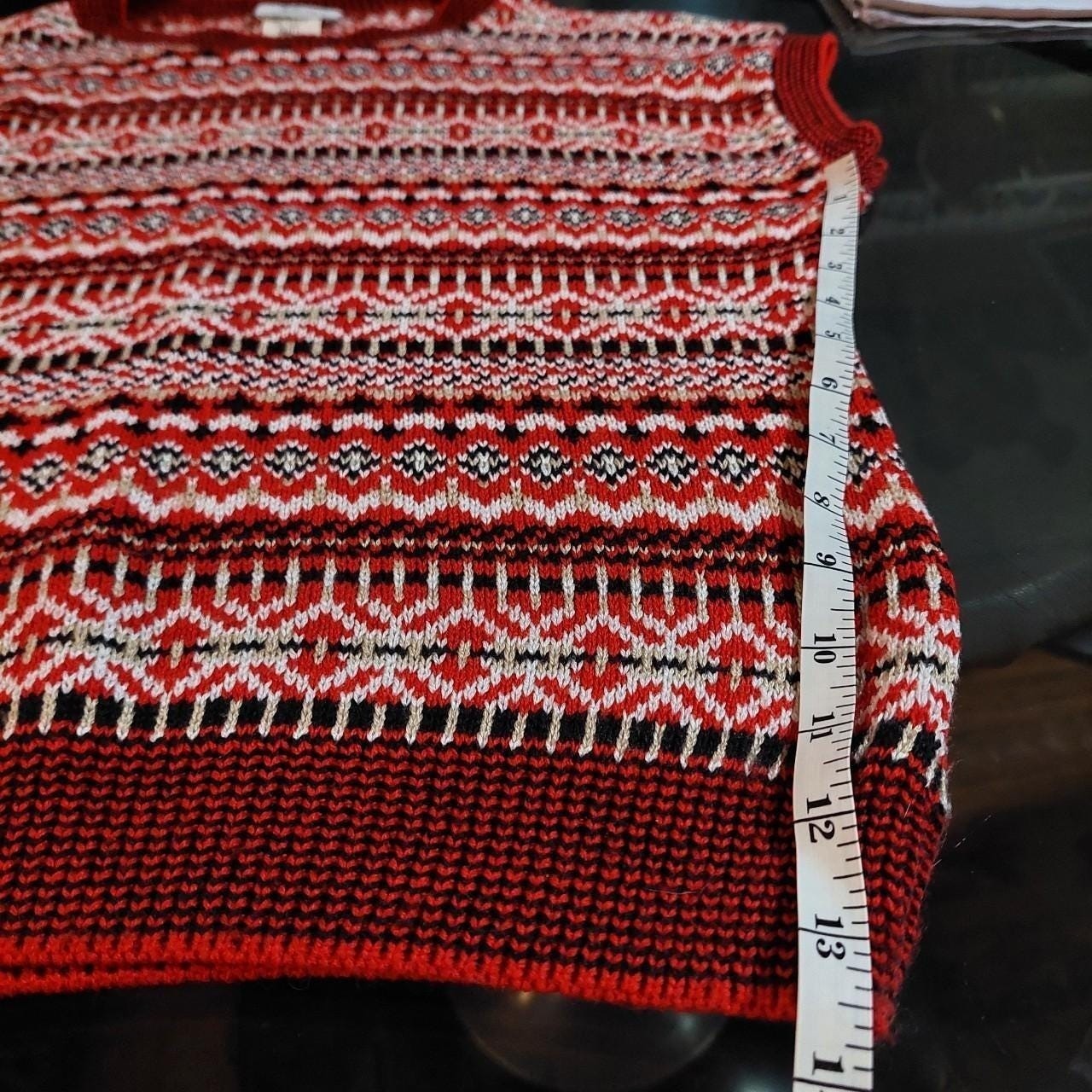 Vintage red, black, white, and tan geometric patterned sweater vest.