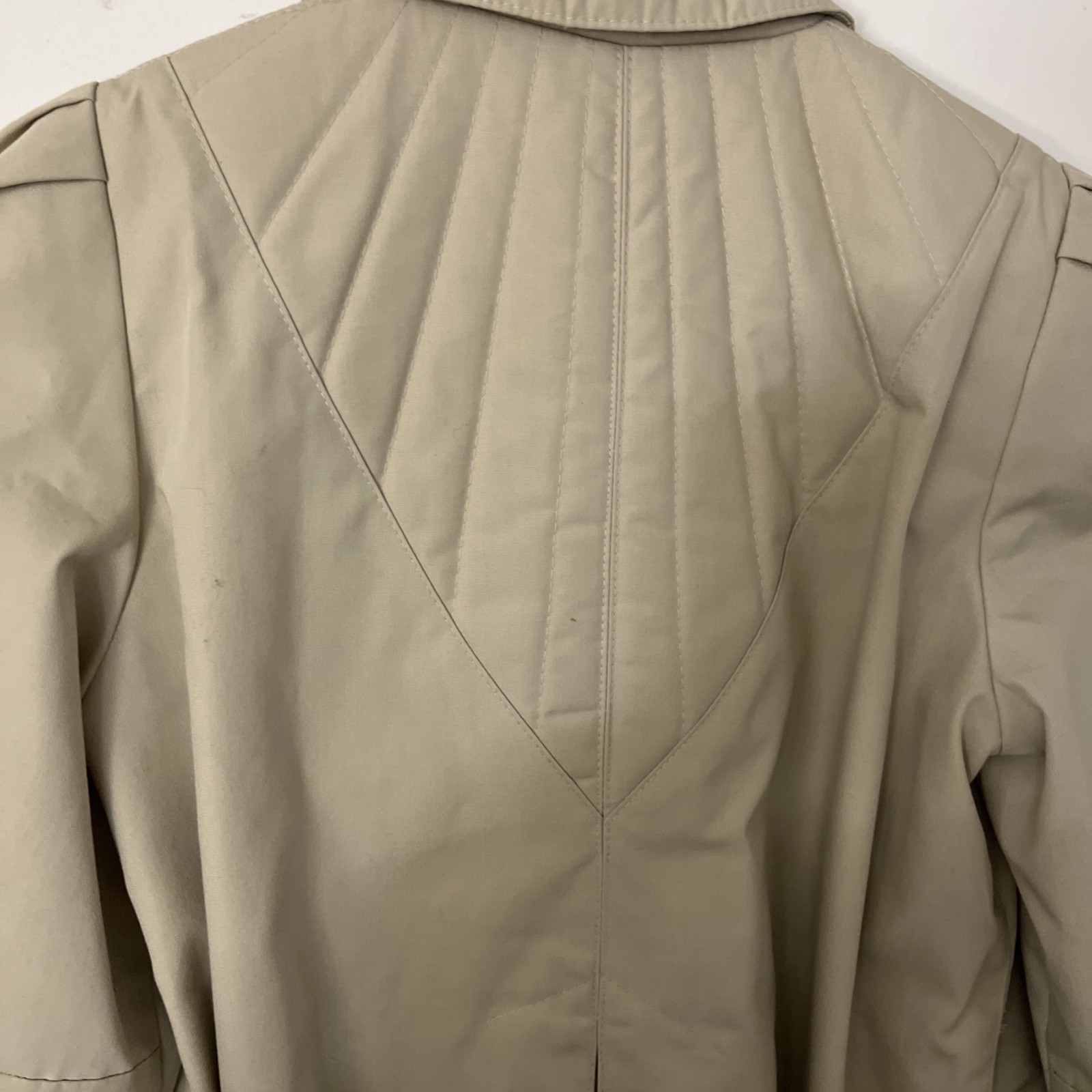 Vintage Woman’s Trench Coat belted Light weight. Very Nice Soft Fabric