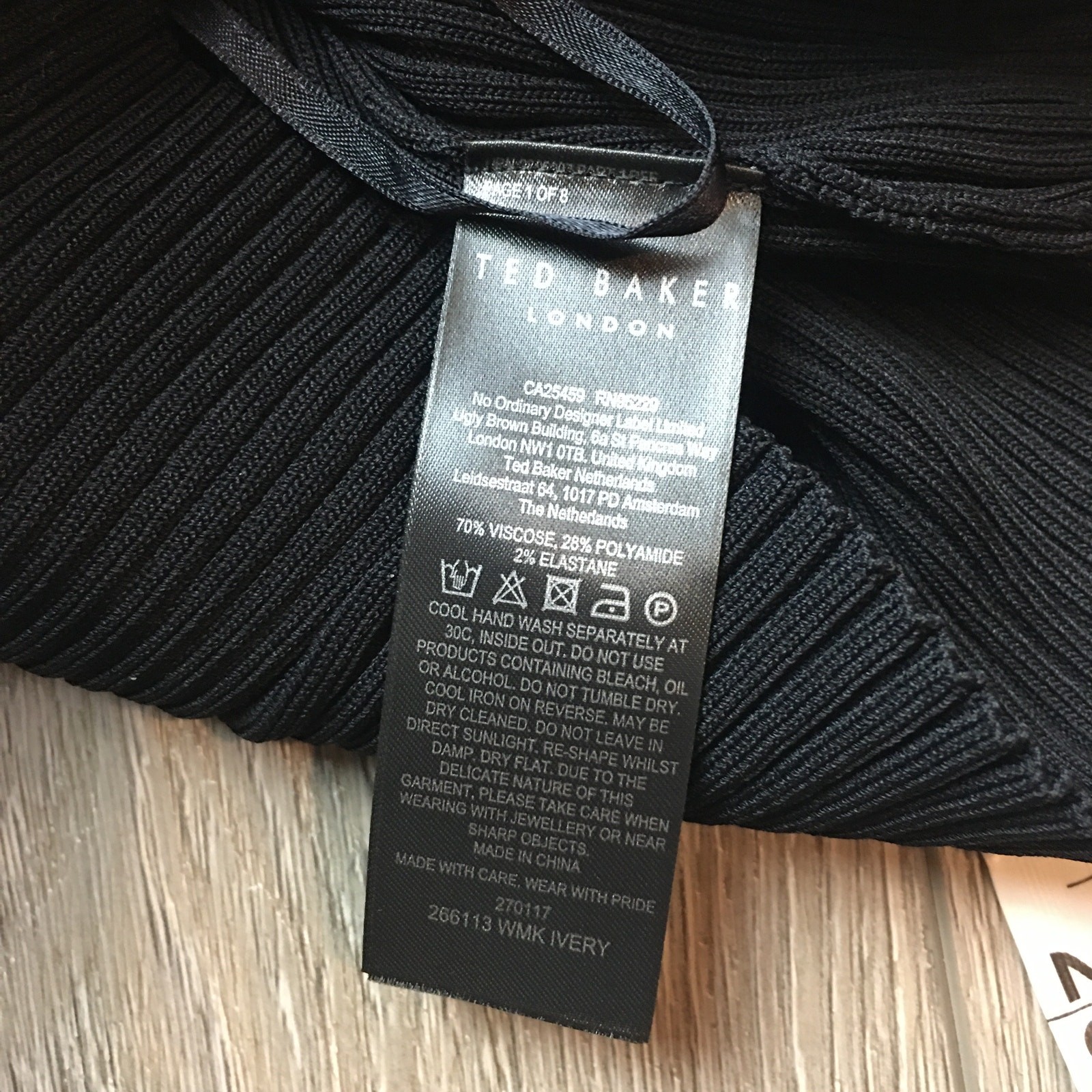 NWT ted baker rib detail knit top with extreme sleeves Size 4 Black