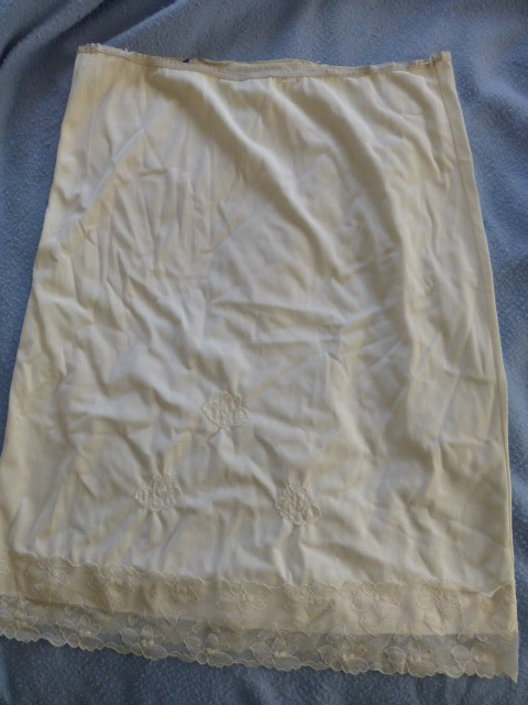 Over five seven shops tall beige L slip stretched out needs elastic stains