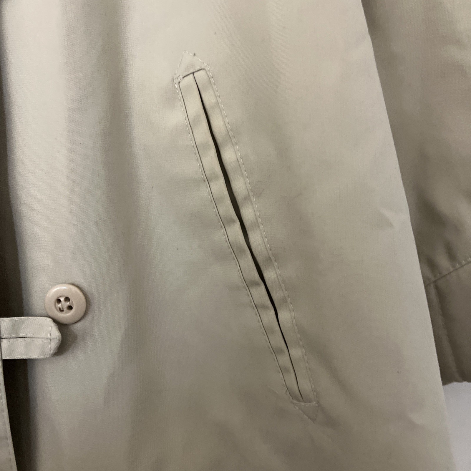 Vintage Woman’s Trench Coat belted Light weight. Very Nice Soft Fabric