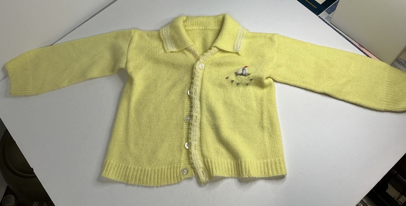 Vintage 1950s Santone romper, sailboat knit, and classic cardigans