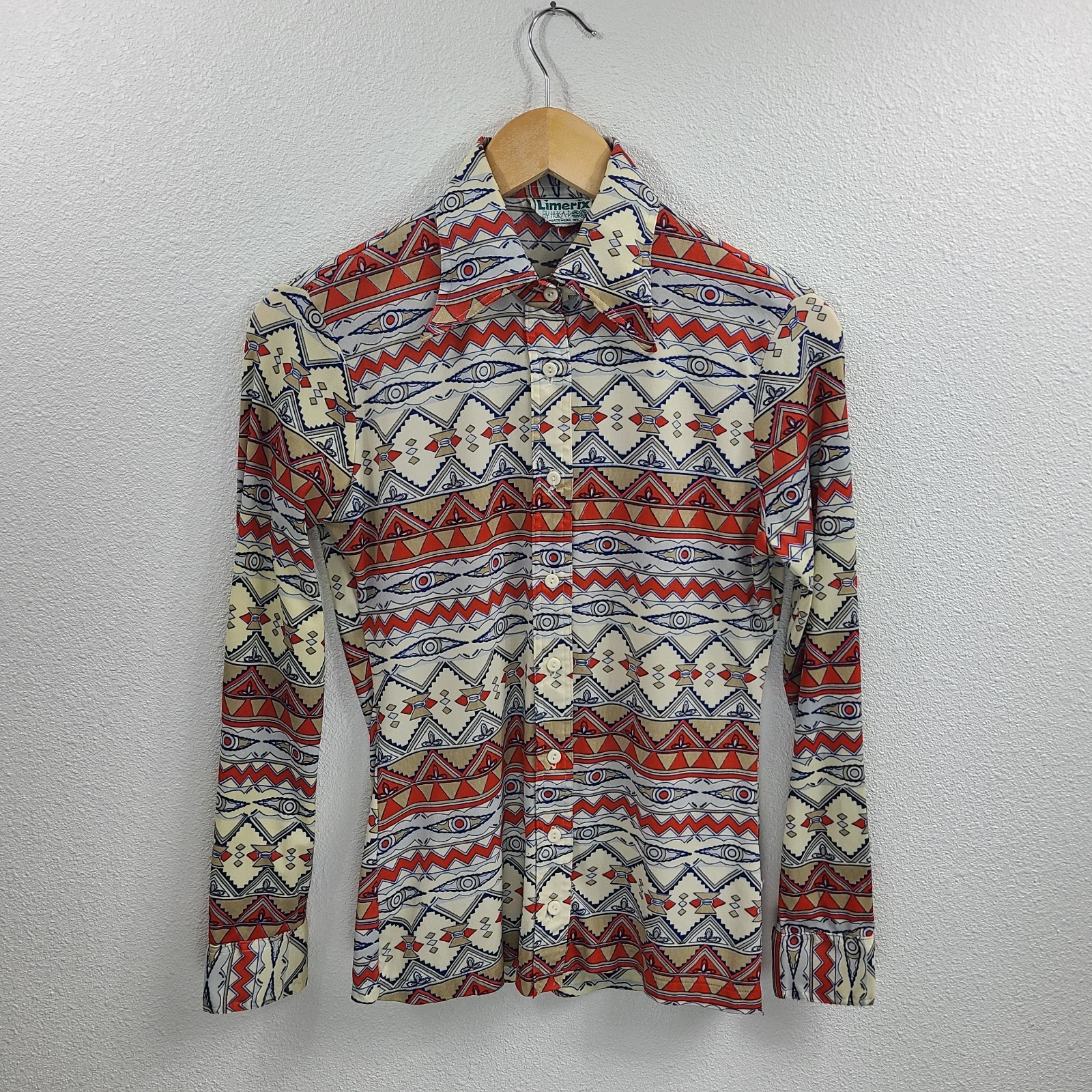 Vintage 70s orange, blue and cream geometric eye print blouse Limerix by Hukapoo